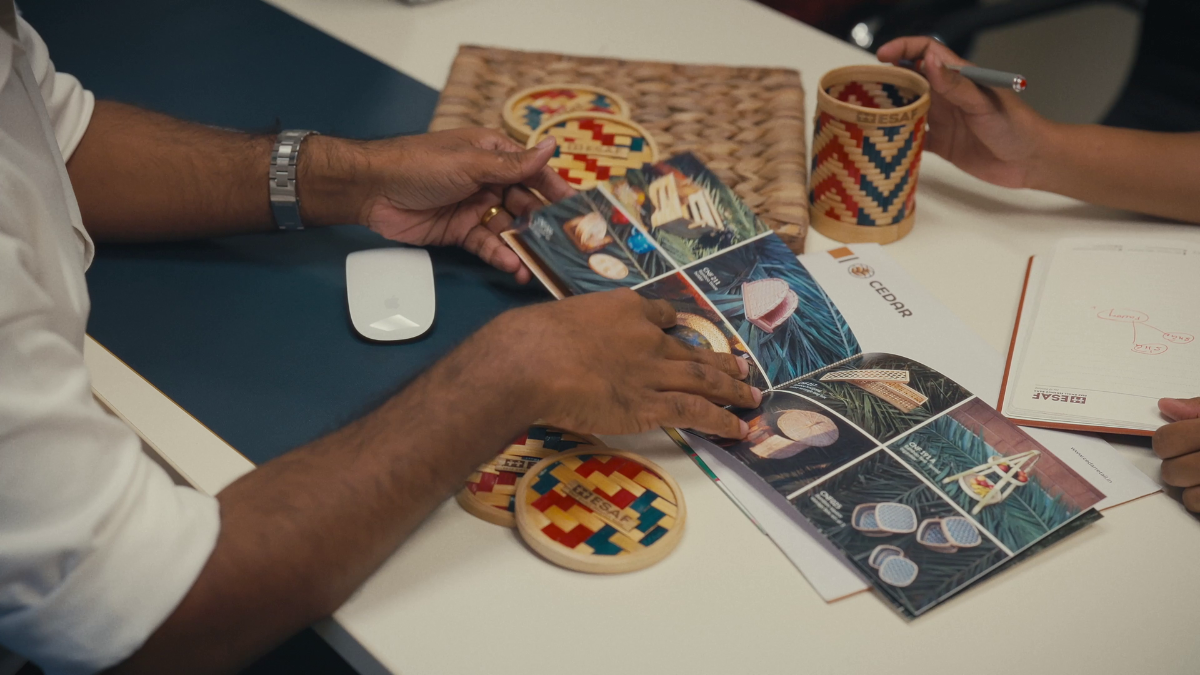 Bamboo craft artisans with finished bamboo products